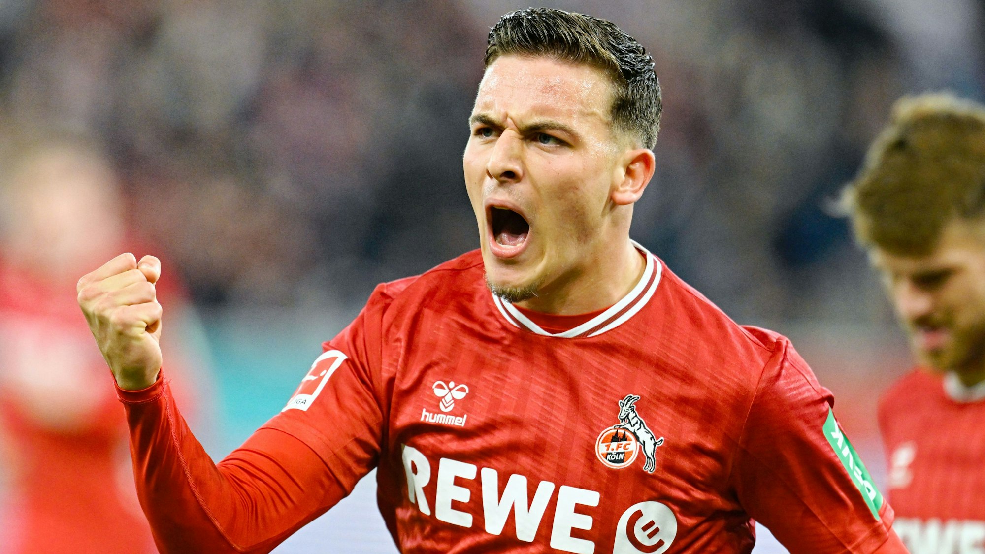 Torschütze Said El Mala (l, 1. FC Köln) jubelt über das Tor zum 0:1.