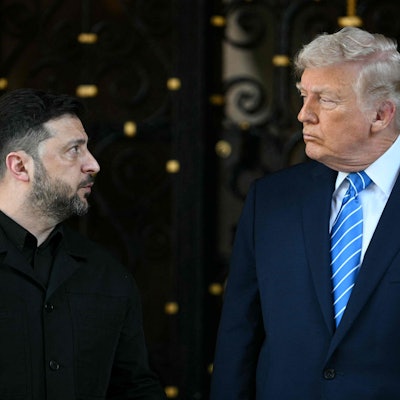 TOPSHOT - US President Donald Trump welcomes Ukranian President Volodymyr Zelensky at his Mar-a-Lago residence in Palm Beach, Florida, on December 28, 2025. (Photo by Jim WATSON / AFP)
