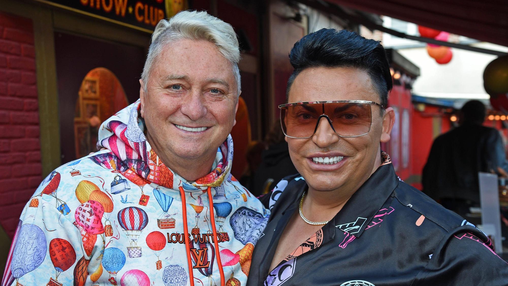 Hubert Fella und Matthias Mangiapane lächeln.