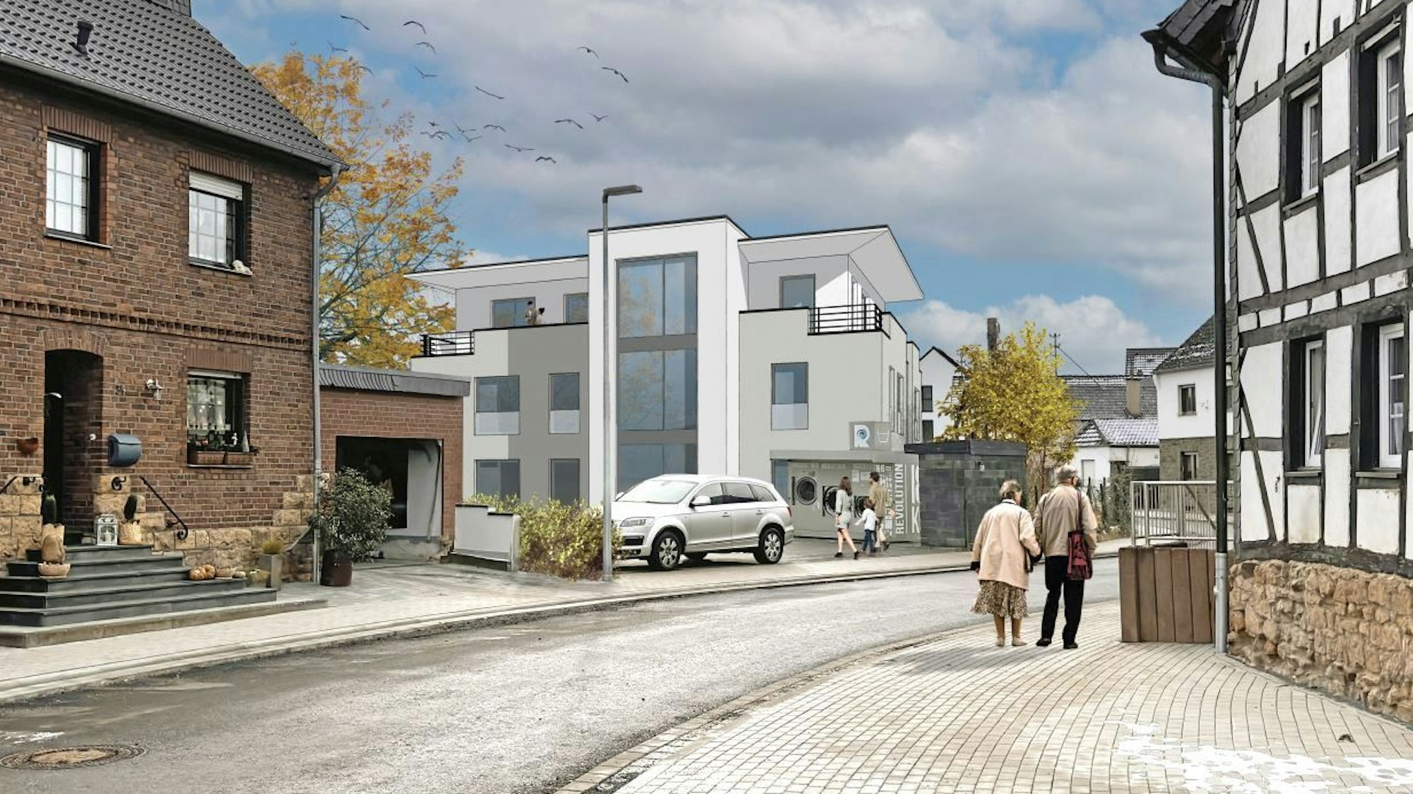 Visualisierung eines geplanten Mehrfamilienhauses in Antweiler, inmitten der bestehenden Bebauung.