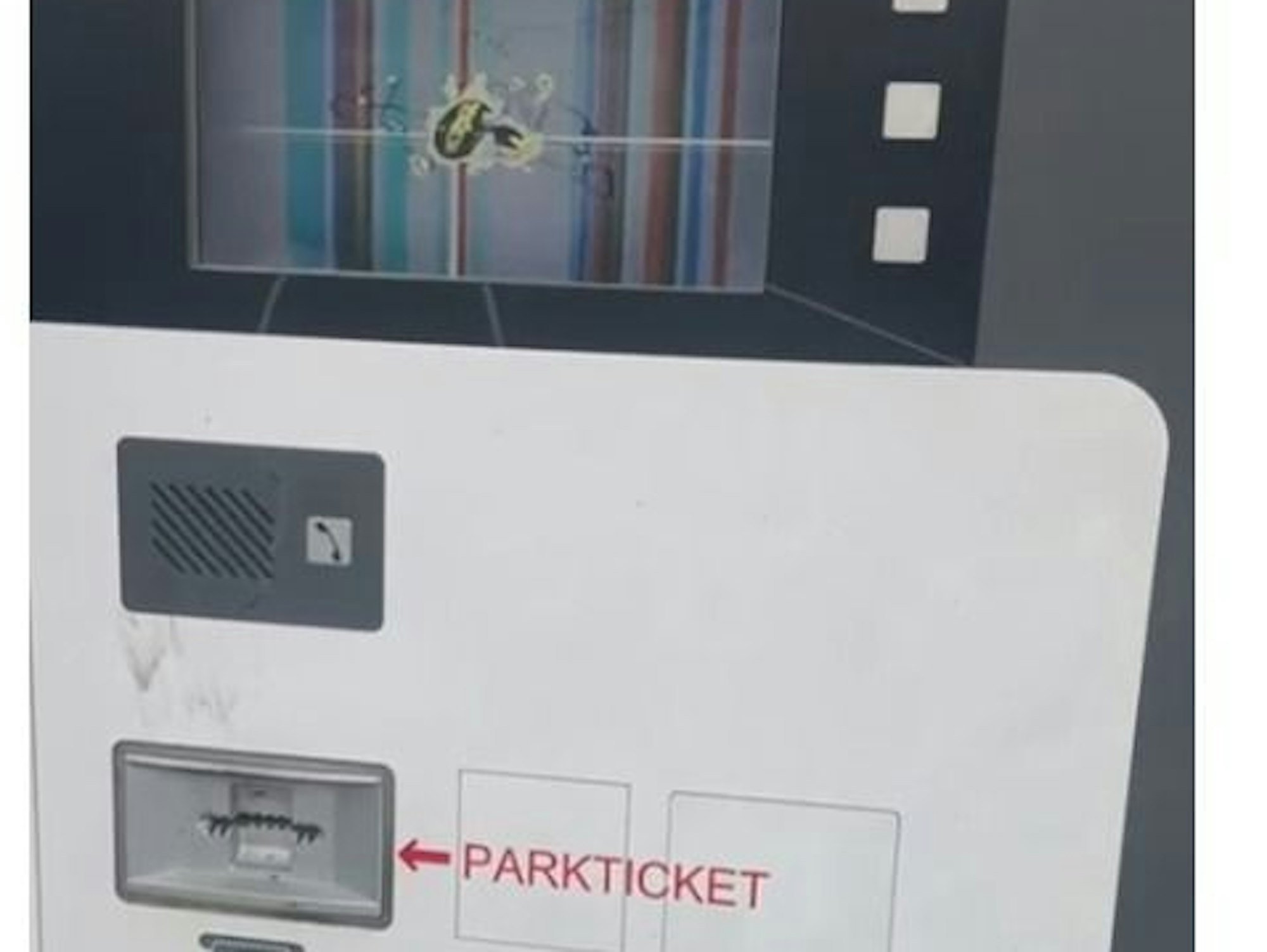 Das Display eines Parkautomats ist gesprungen und kaputt.