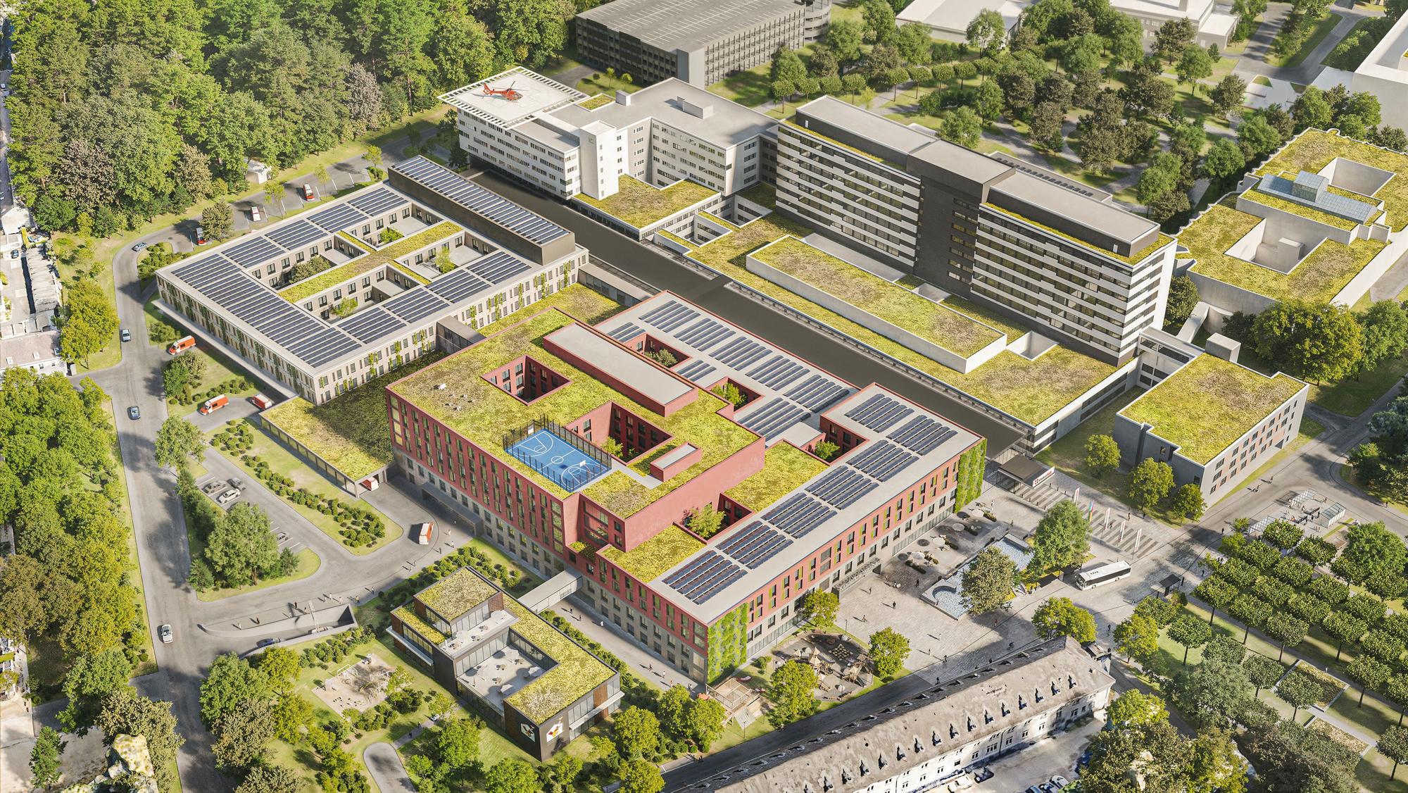 Die neue Kinderklinik (rot) und der Erweiterungsbau (hellgrau) entstehen an der Nordseite der Bestandsgebäude (hinten).