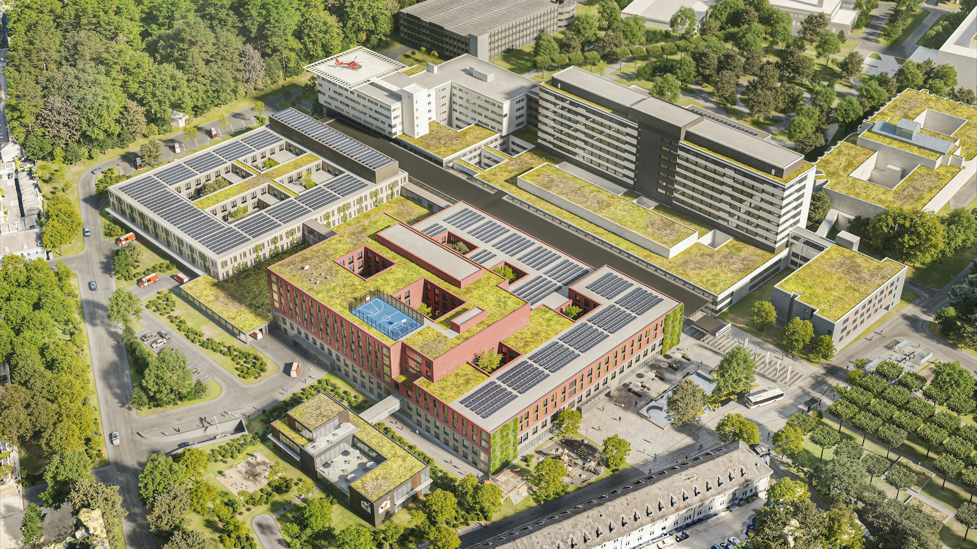 Die neue Kinderklinik (rot) und der Erweiterungsbau (hellgrau) entstehen an der Nordseite der Bestandsgebäude (hinten).