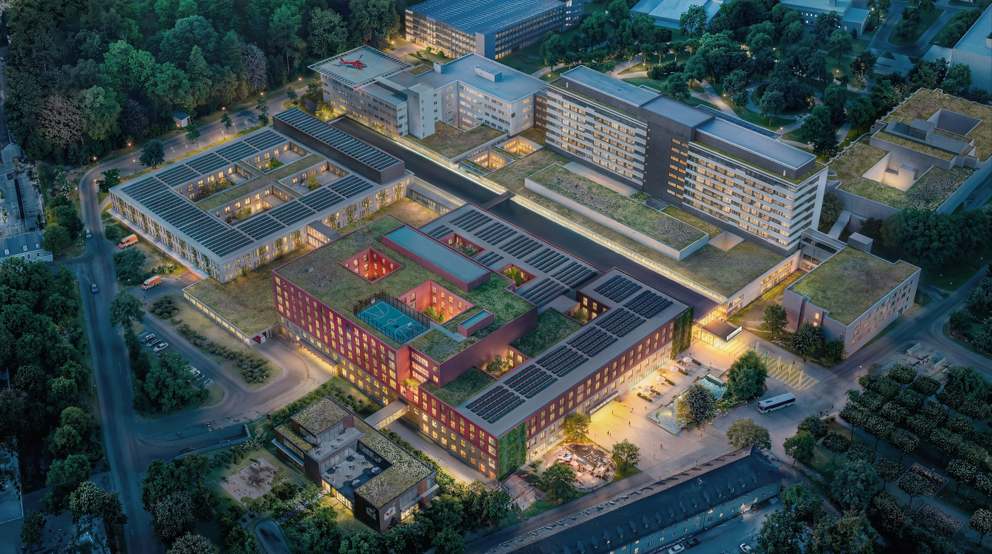 Die Visualisierung zeigt den geplanten Gesundheitscampus Merheim bei Nacht.