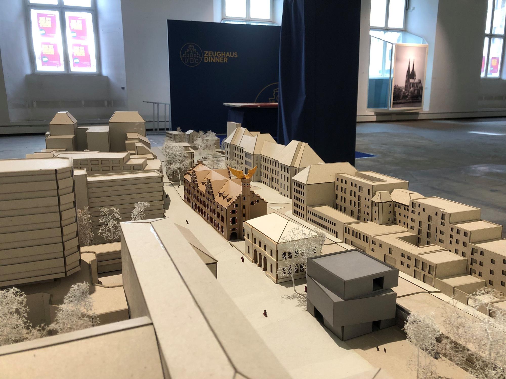 Der Entwurf von Sina Eschweiler sieht einen Neubau (v.) mit mehreren verdrehten Ebenen vor.