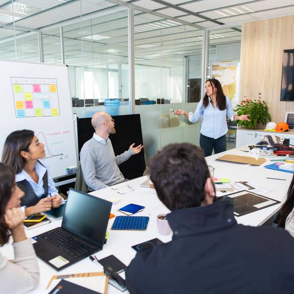 Manager arriving to lead teamwork in modern office during meeting model released, Symbolfoto property released, PCLF03319
