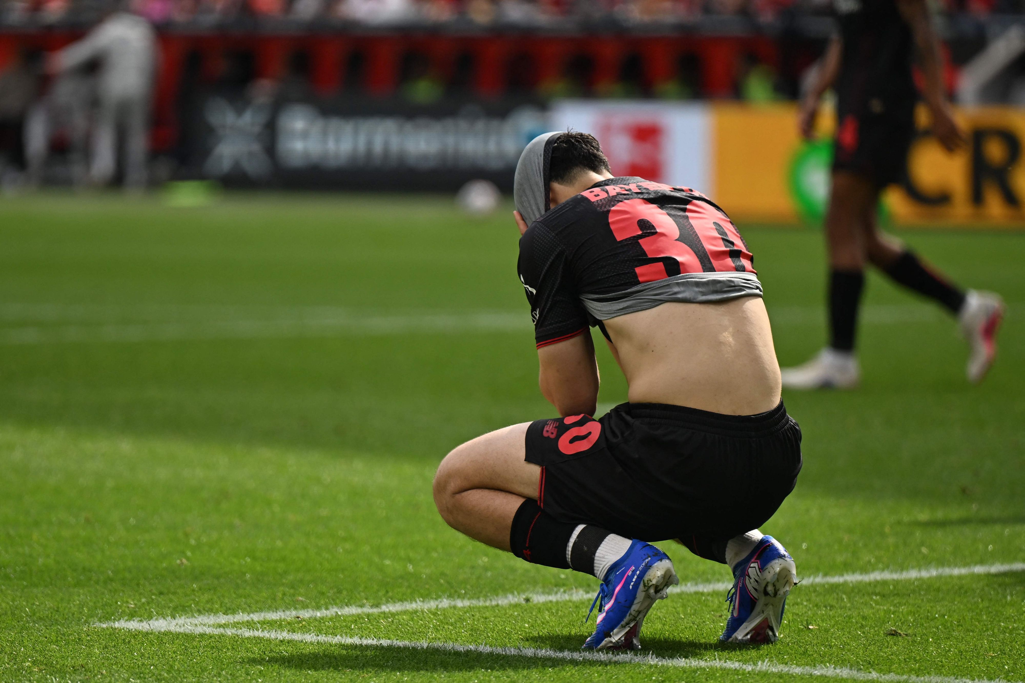 Bayer Leverkusen's Algerian midfielder #30 Ibrahim Maza reacts during the German first division Bundesliga football match between Bayer Leverkusen and Hamburger SV (HSV) in Leverkusen, western Germany, on May 16, 2026. (Photo by INA FASSBENDER / AFP) / DFL REGULATIONS PROHIBIT ANY USE OF PHOTOGRAPHS AS IMAGE SEQUENCES AND/OR QUASI-VIDEO