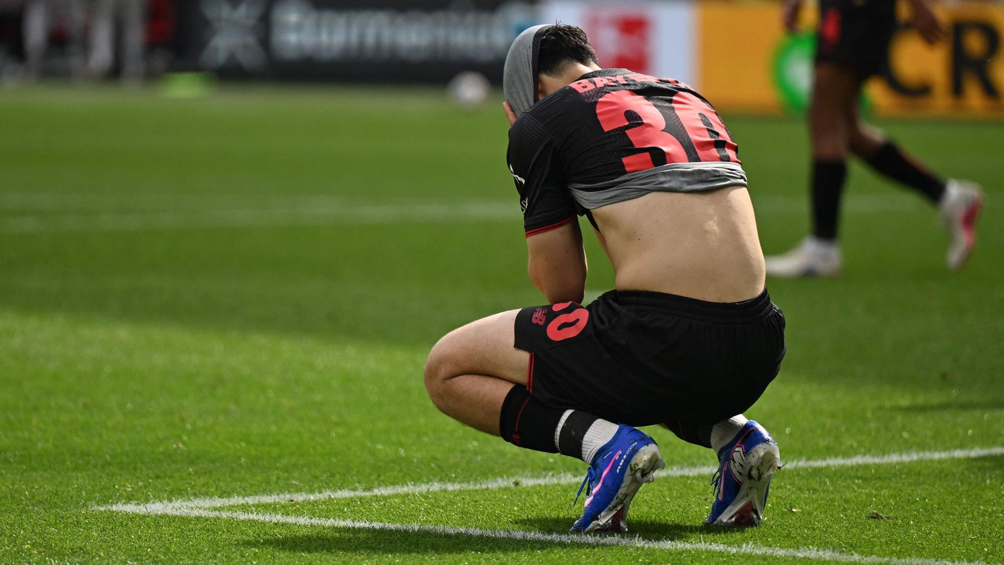Bayer Leverkusen's Algerian midfielder #30 Ibrahim Maza reacts during the German first division Bundesliga football match between Bayer Leverkusen and Hamburger SV (HSV) in Leverkusen, western Germany, on May 16, 2026. (Photo by INA FASSBENDER / AFP) / DFL REGULATIONS PROHIBIT ANY USE OF PHOTOGRAPHS AS IMAGE SEQUENCES AND/OR QUASI-VIDEO