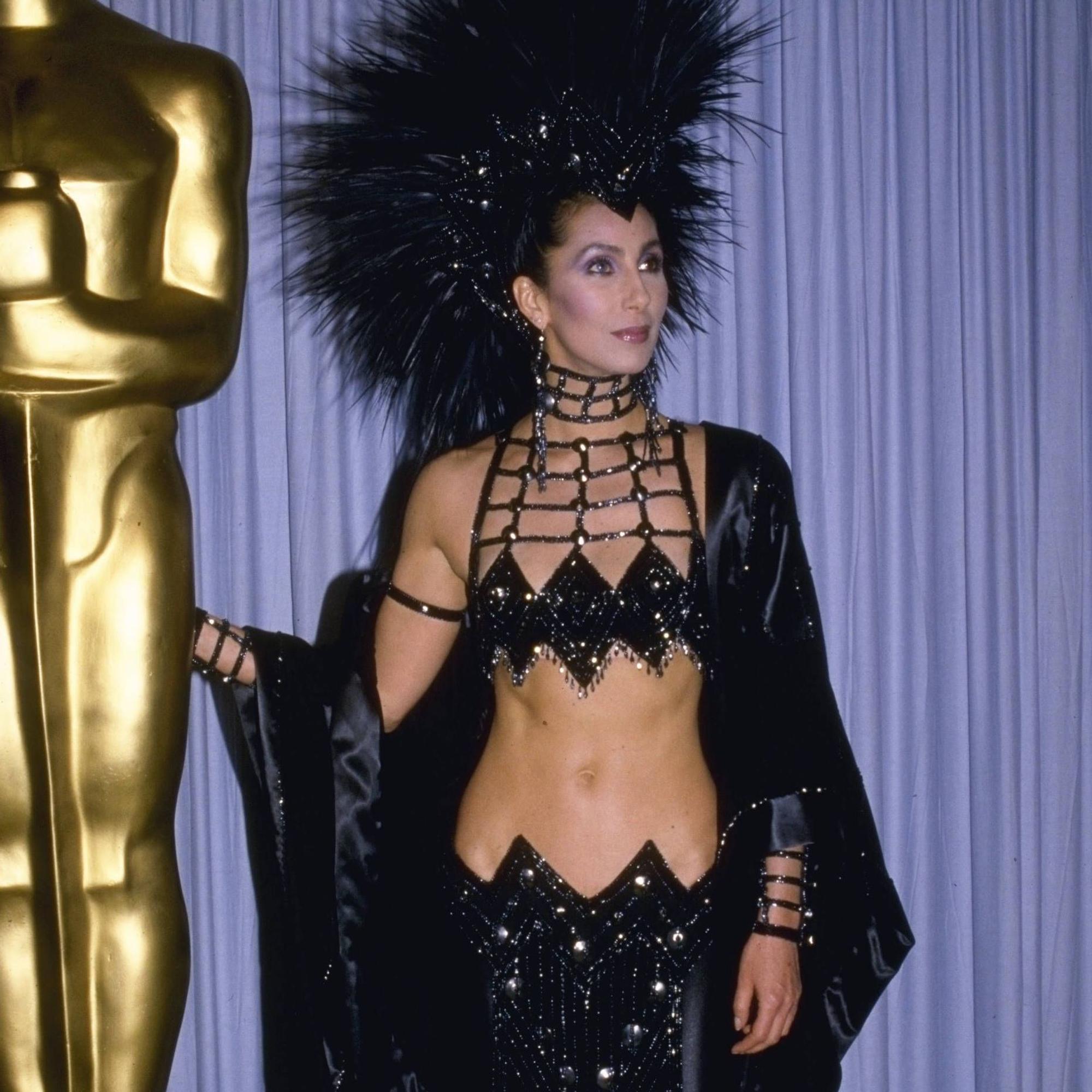 Cher 1986 CHER in an outrageous Bob Mackie design at the 1986 Academy Awards. Michelson - Roger Karnbad/1986 Los Angeles