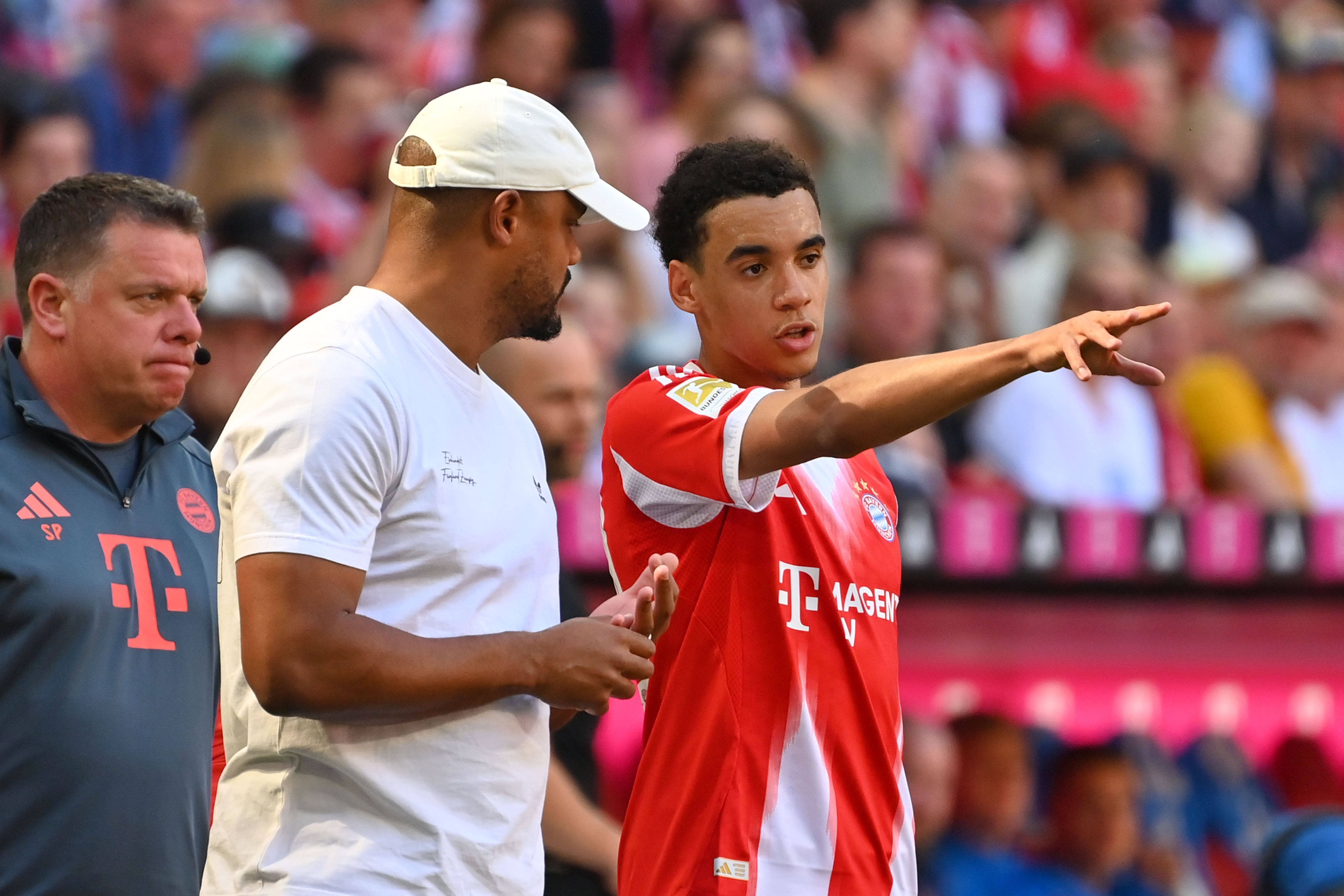 Vincent Kompany und Jamal Musiala (r.)