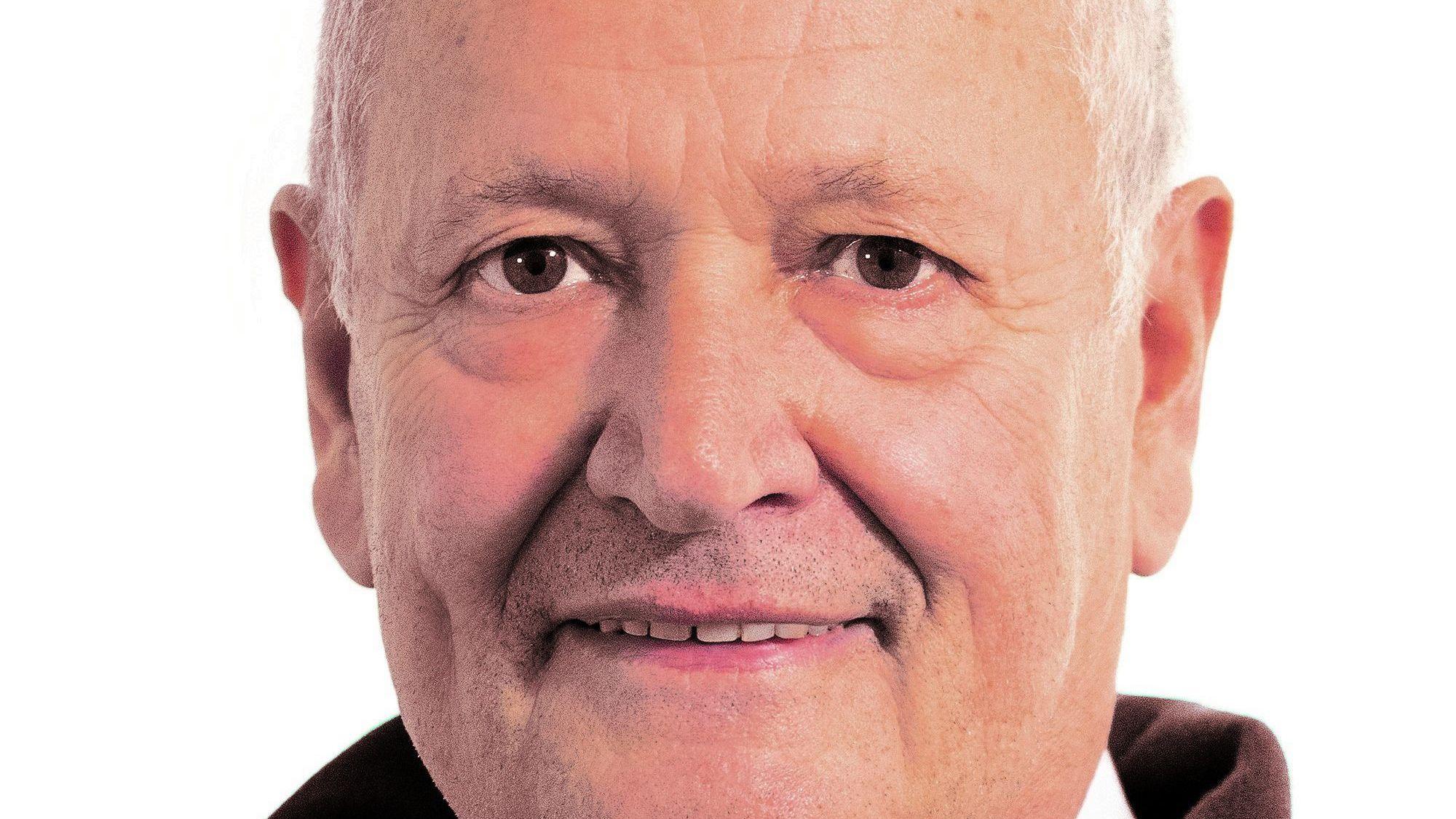 Porträtfoto von dem Politiker.
