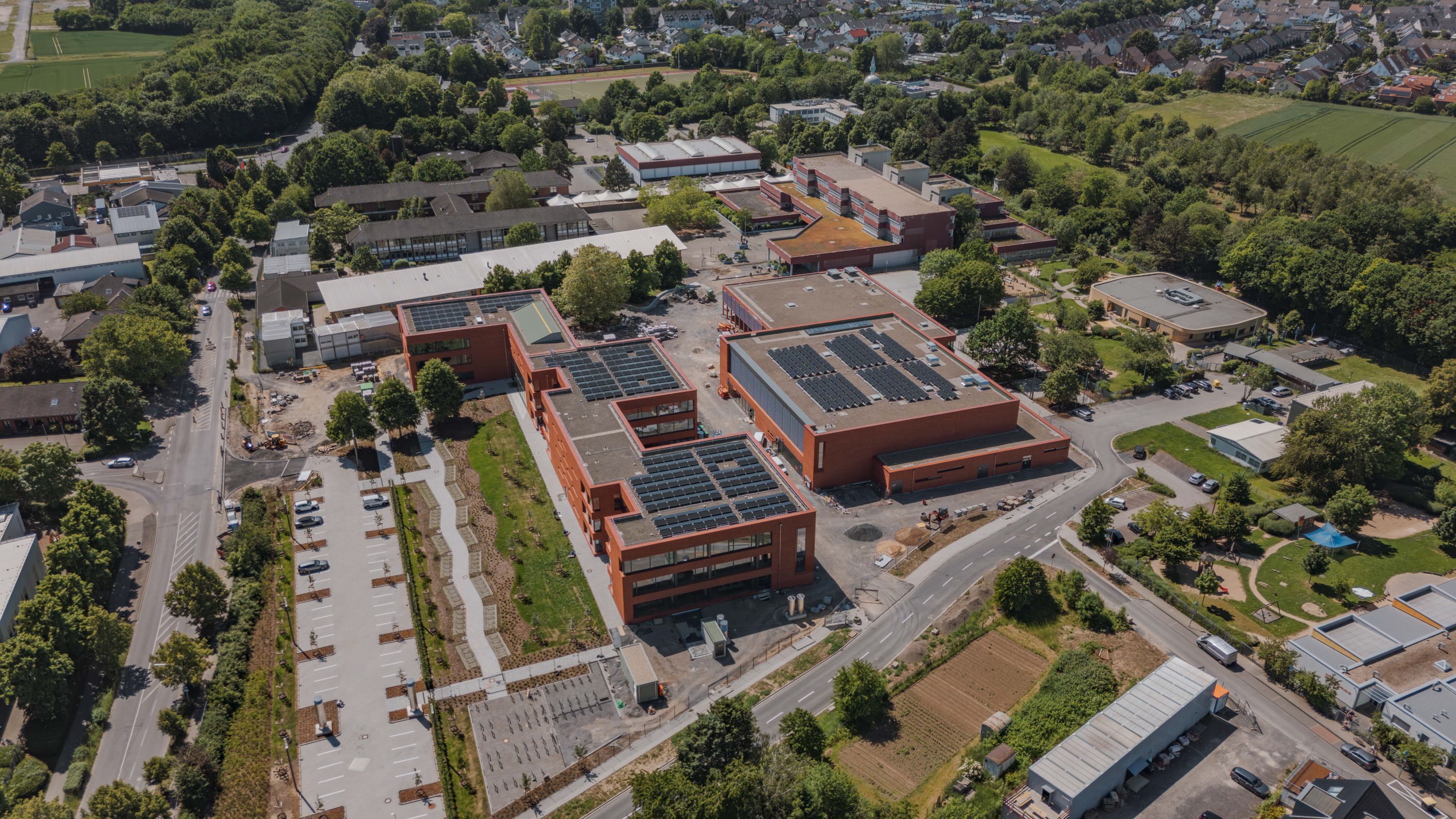 Das Niederkasseler Schulzentrum Nord wird zurzeit erweitert. Ob wegen der Probleme mit der Bonner Nordbrücke dort künftig mehr Schülerinnen und Schüler unterrichtet werden müssen, ist derzeit noch unklar.