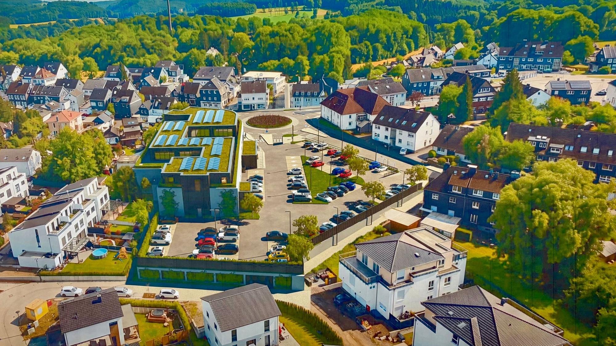 Perspektive auf die Rückseite des Lidl mit dem Sockel an der Rosendelle
