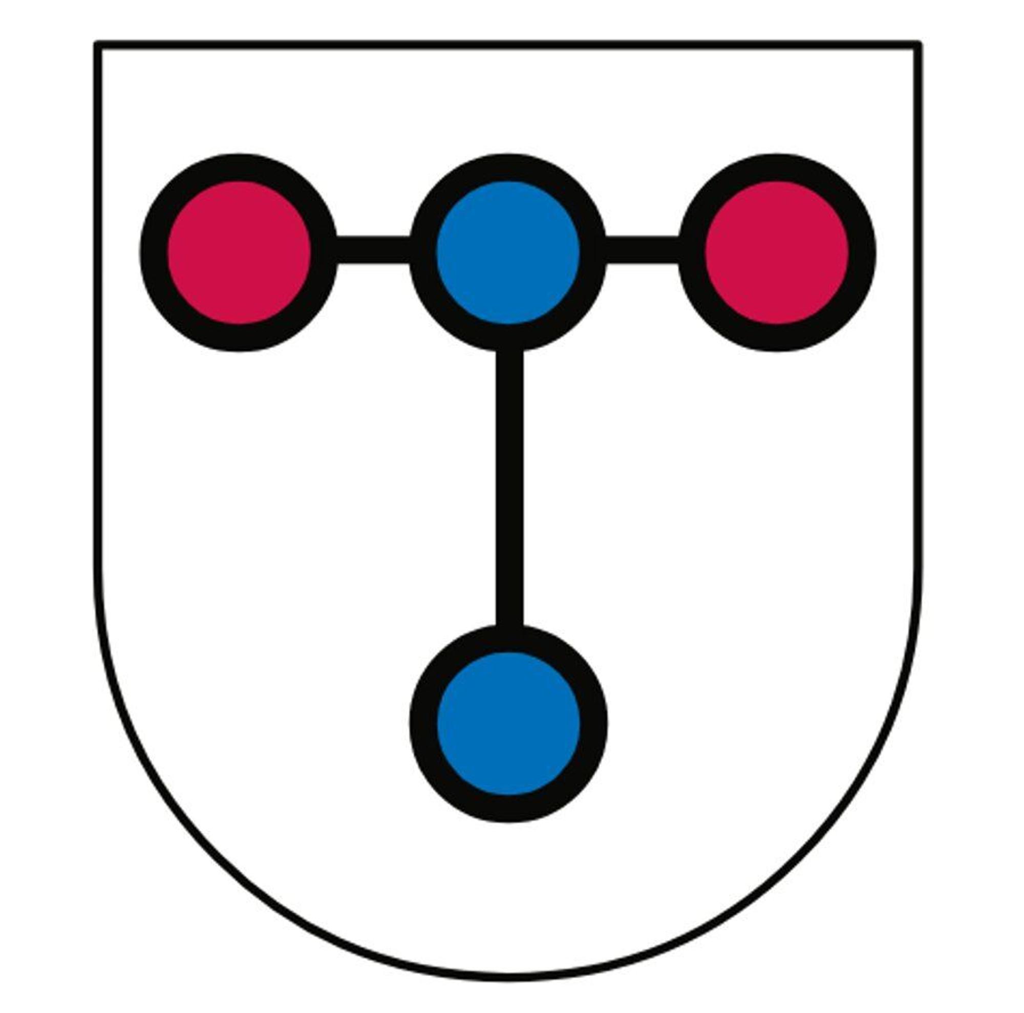 Auf dem Wappen der Stadt Troisdorf bilden zwei rote Kreise, links und rechts außen und zwei vertikale blaue Kreise eine T-Formation.