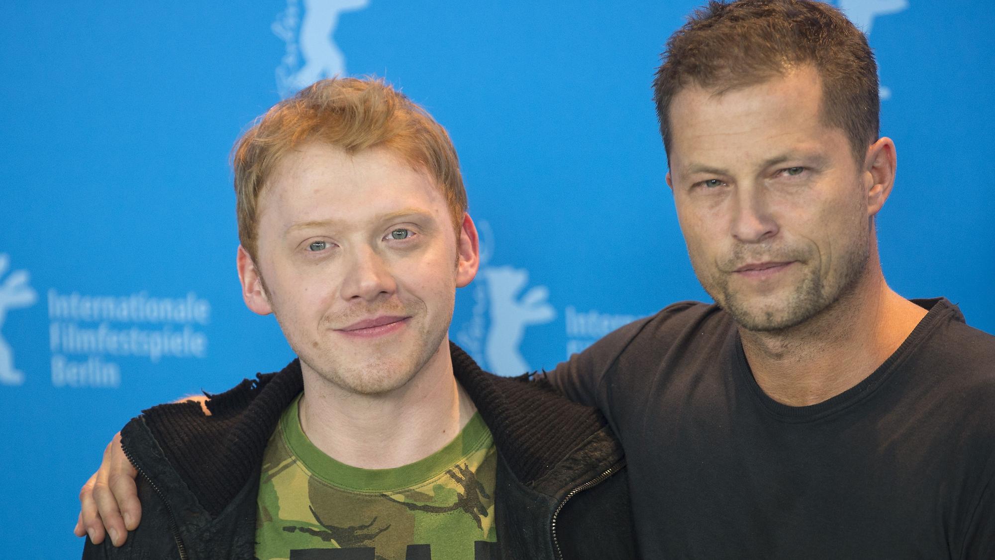 Rupert Grint und Til Schweiger posieren.