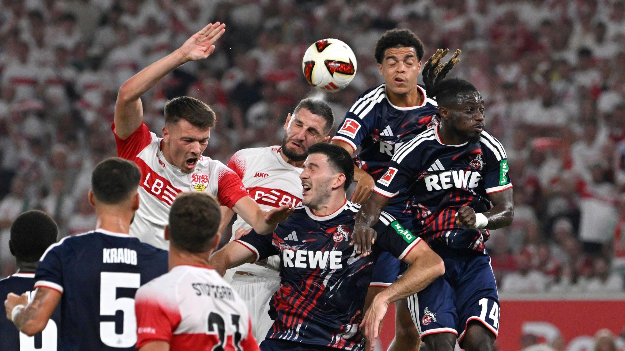 Strafraumszene, Torraumszene Kopfballduell Zweikampf Aktion Dzenan Pejcinovic VfB Stuttgart 17 Jeff Chabot VfB Stuttgart 24 Luka Lochoshvili 1. FC Koeln KOE 24 VfB Stuttgart vs 1. FC Koeln 04.09.2026 DFL REGULATIONS PROHIBIT ANY USE OF PHOTOGRAPHS AS IMAGE SEQUENCES AND/OR QUASI-VIDEO VfB Stuttgart vs 1. FC Koeln *** Penalty area play, Goalmouth scene, header duel, tackle, action: Dzenan Pejcinovic VfB Stuttgart 17, Jeff Chabot VfB Stuttgart 24, Luka Lochoshvili 1. FC Köln KOE 24. VfB Stuttgart vs. 1. FC Köln, September 4, 2026, DFL regulations prohibit any use of photographs as image sequences and/or quasi-video. VfB Stuttgart vs. 1. FC Köln