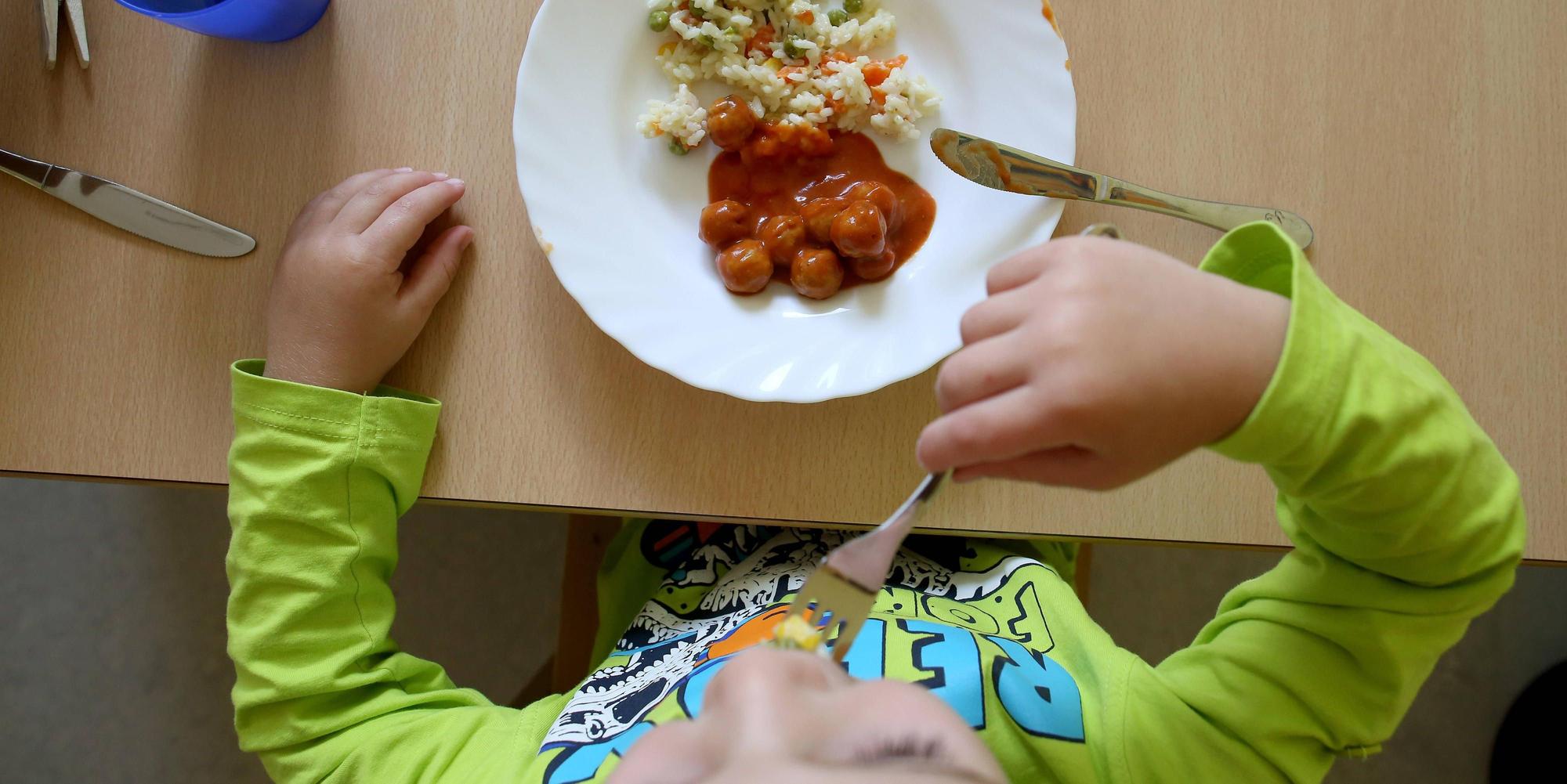Kind im Kindergarten Essen
