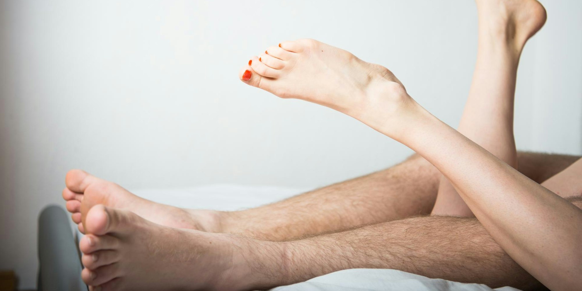 Paar im Bett und hat Sex