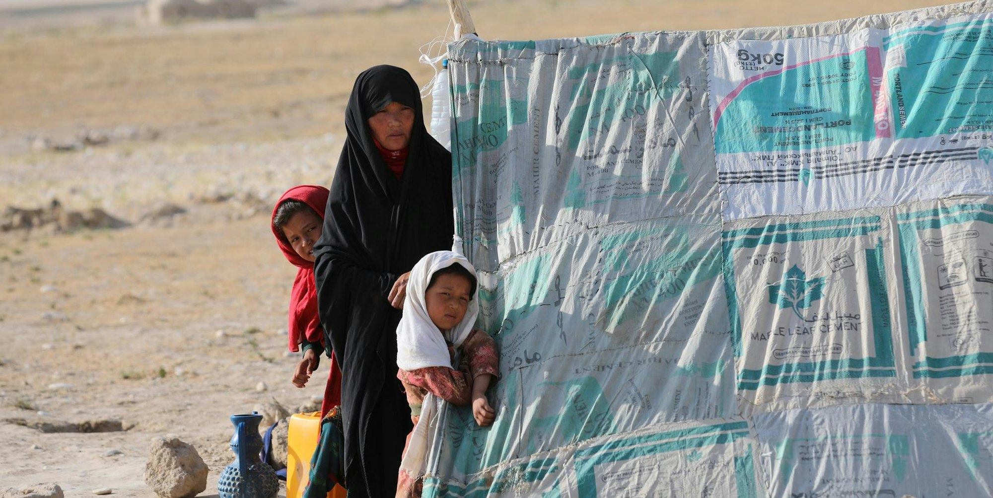 Flüchtlinge in einem Zelt