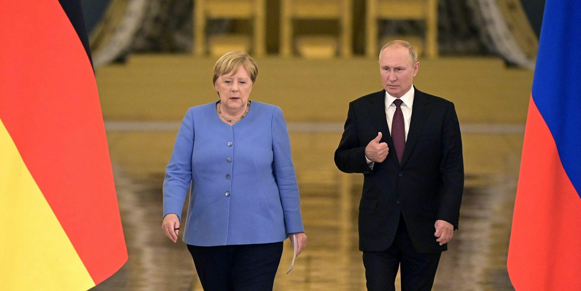 Putin Merkel afp