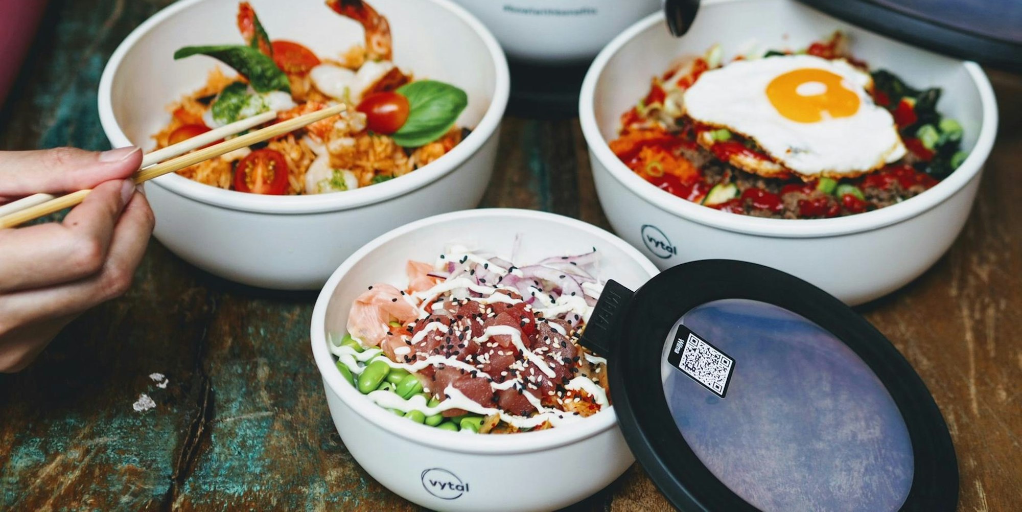 Verschiedene Gerichte sind in den Mehrwegschalen von Vytal zu sehen.