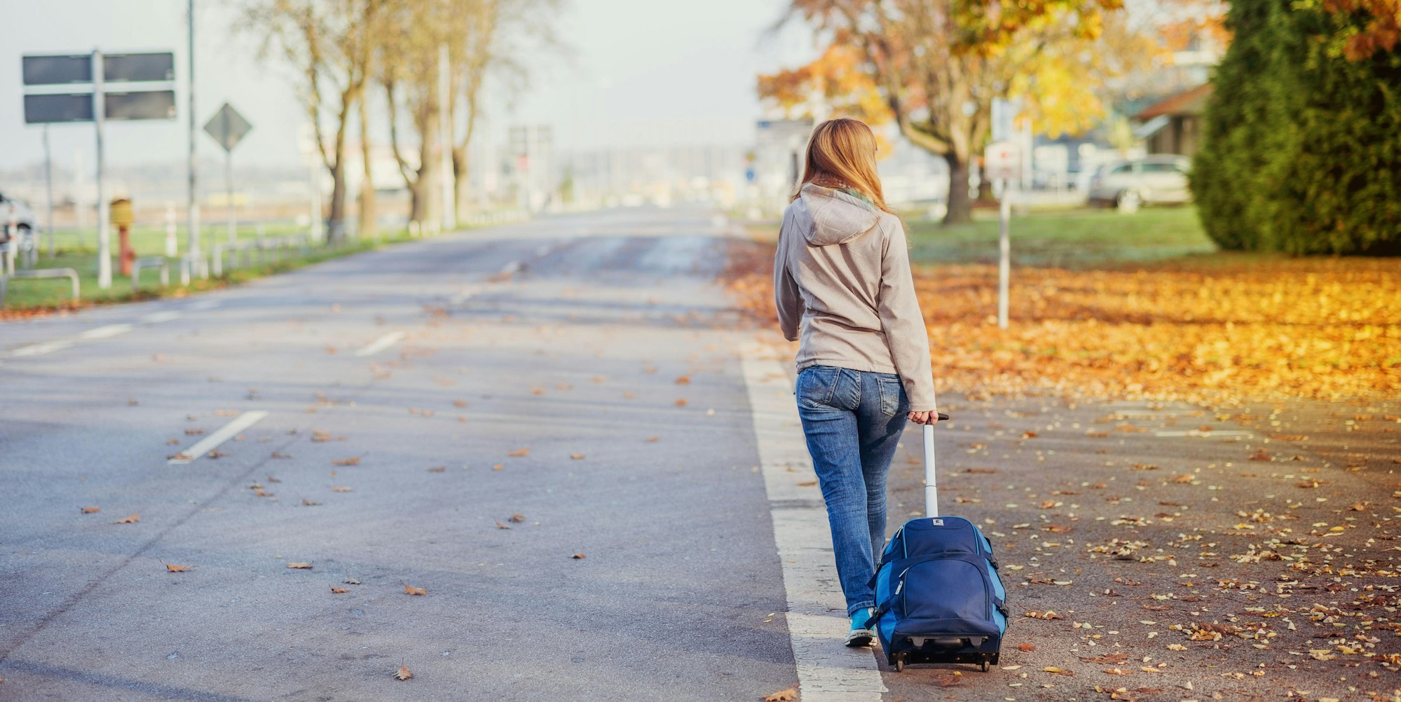 Frau Koffer Straße allein Burn-out Klinik