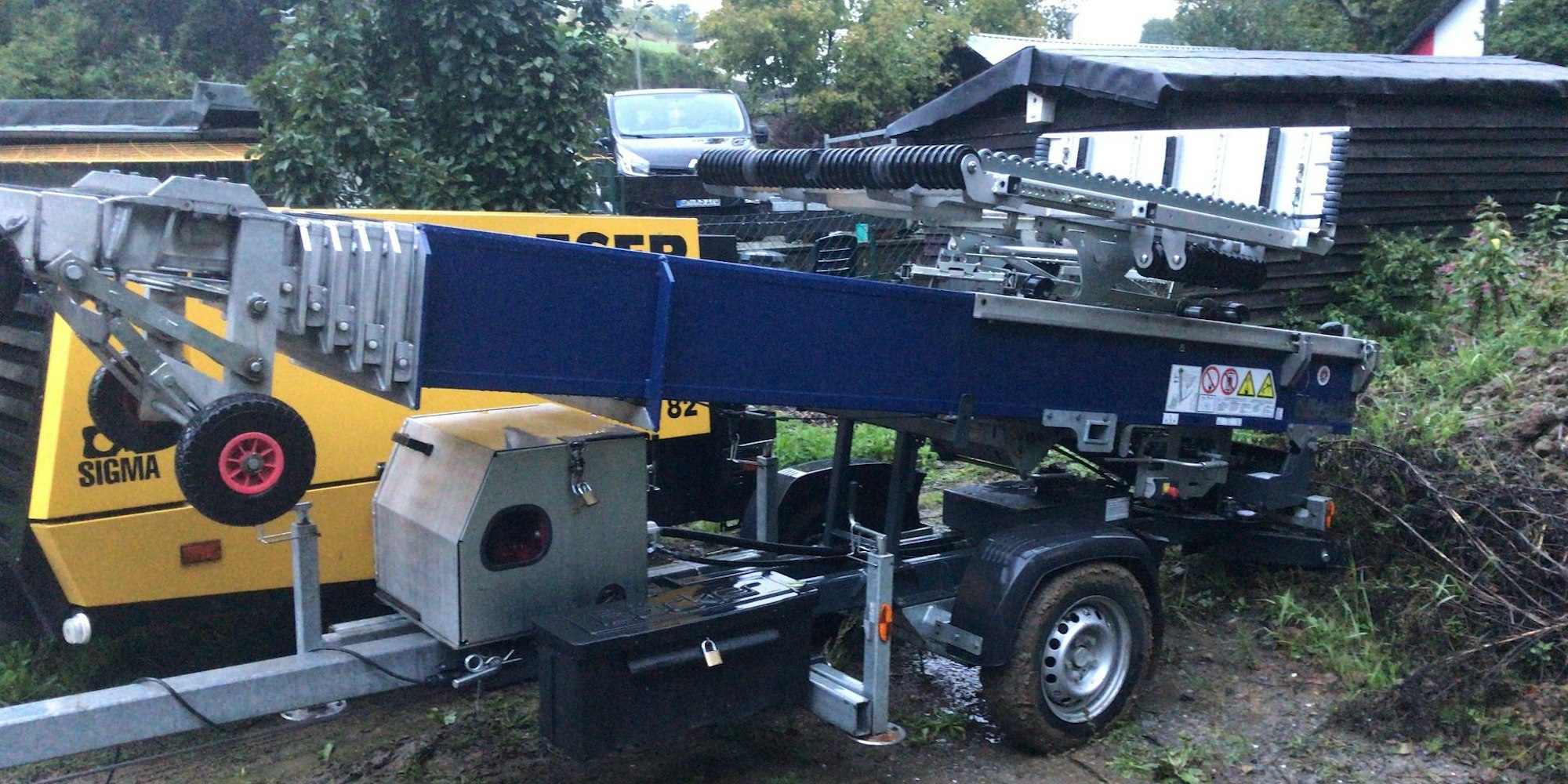 SichergestellterDachdeckeraufzugundKompressor