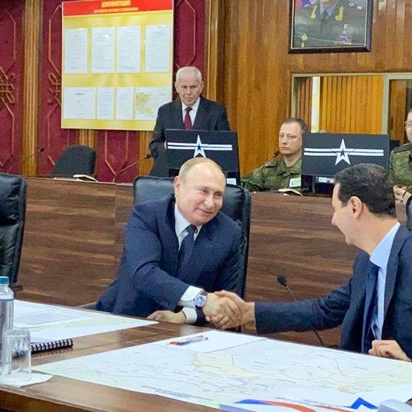 Putin Assad afp